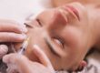 woman is getting botox injected